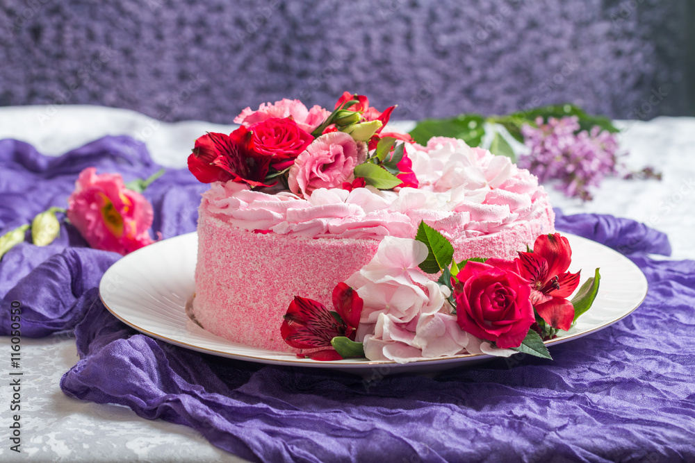 Pink cake with natural beautiful flowers Pink cake with natural beautiful flowers