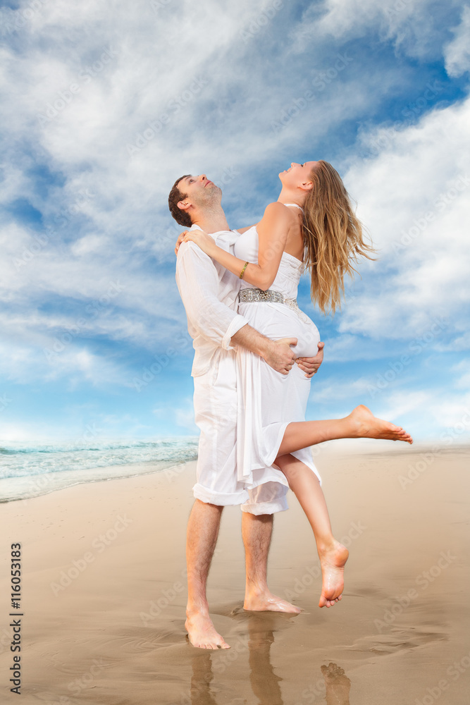 Happy couple on a beach Happy couple on a beach