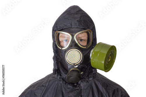 Person in a gas mask on a light background