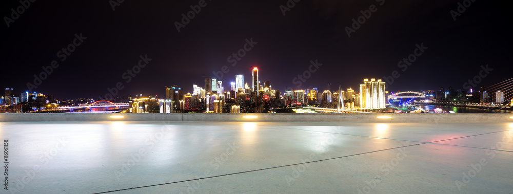 empty floor with cityscape and skyline of chongqing at night