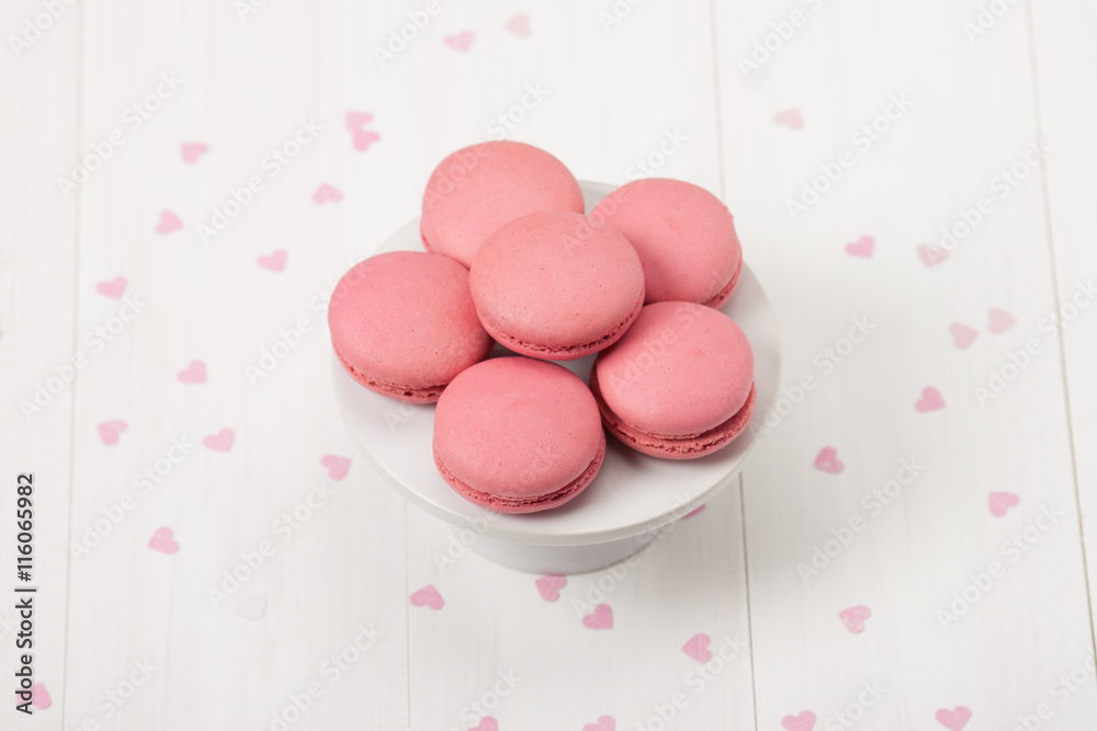 Macaroons Biscuits On White Stand. Paper Hearts Macaroons Biscuits On White Stand. Paper Hearts