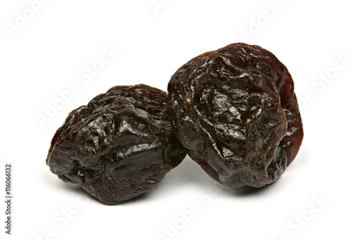 Dried plums on a white background