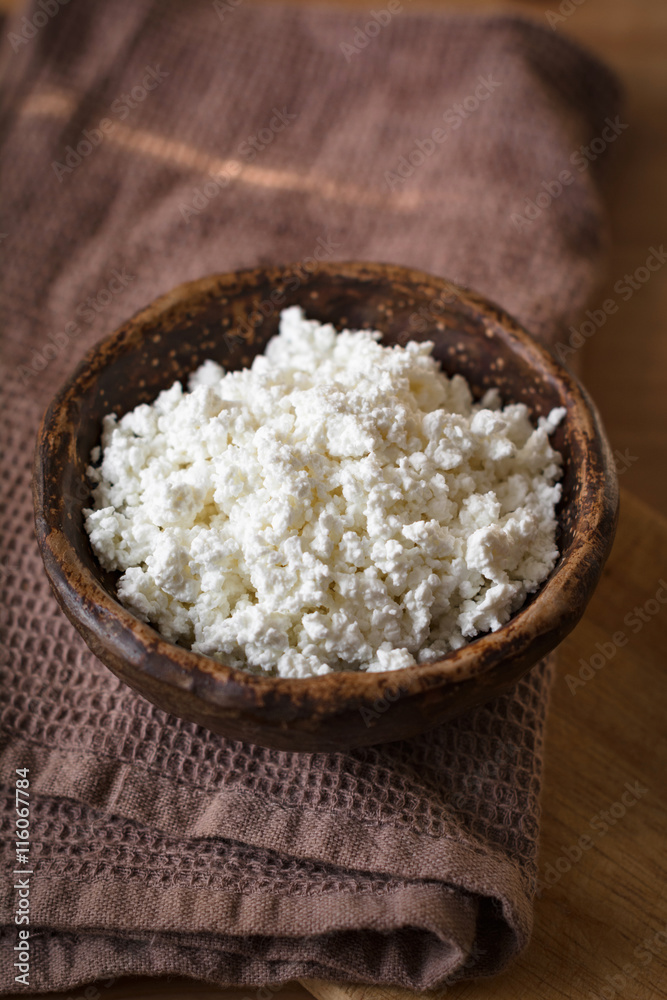 Cottage cheese in rustic bowl