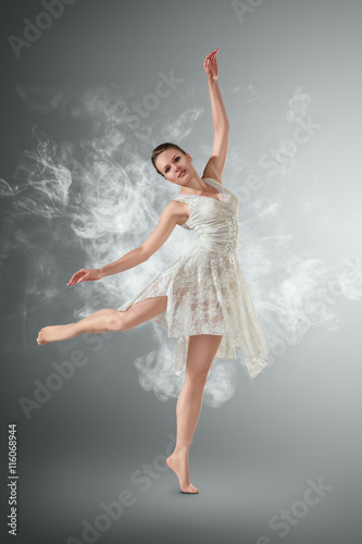 Woman dancing over smoky
