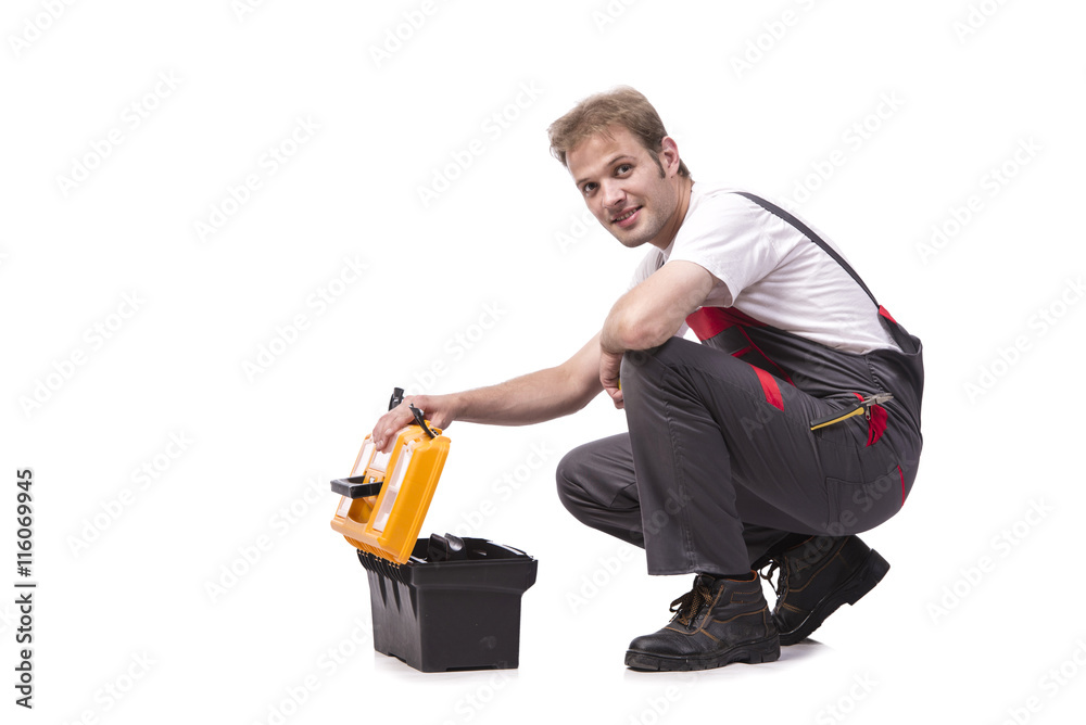 Young man with toolkit toolbox isolated on white Young man with toolkit toolbox isolated on white