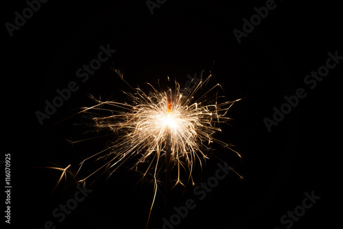 A spark over black background for Christmas and new year party