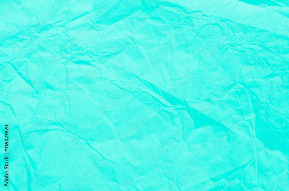 Fototapeta premium crumpled green paper tissue background