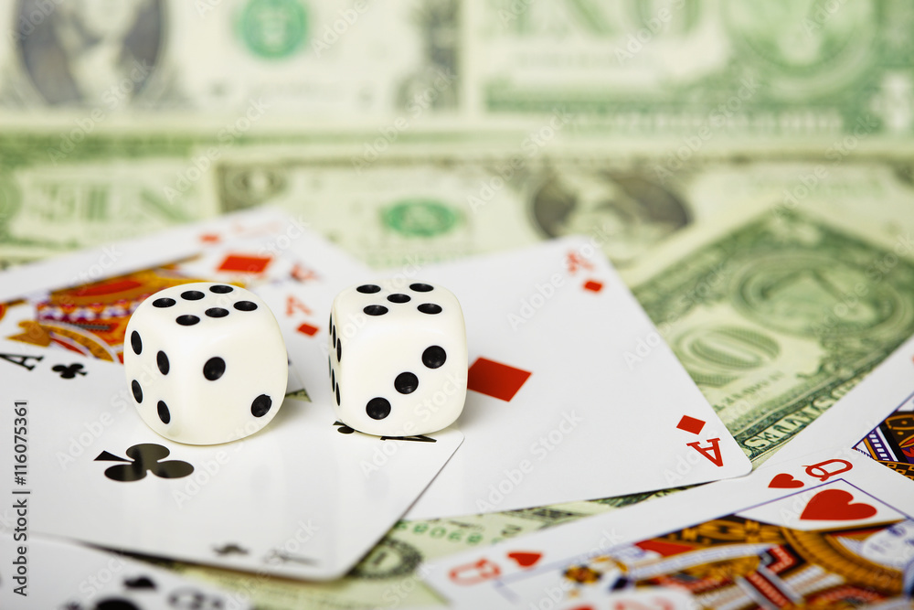 Dices are on cards and money Dices are on cards and money