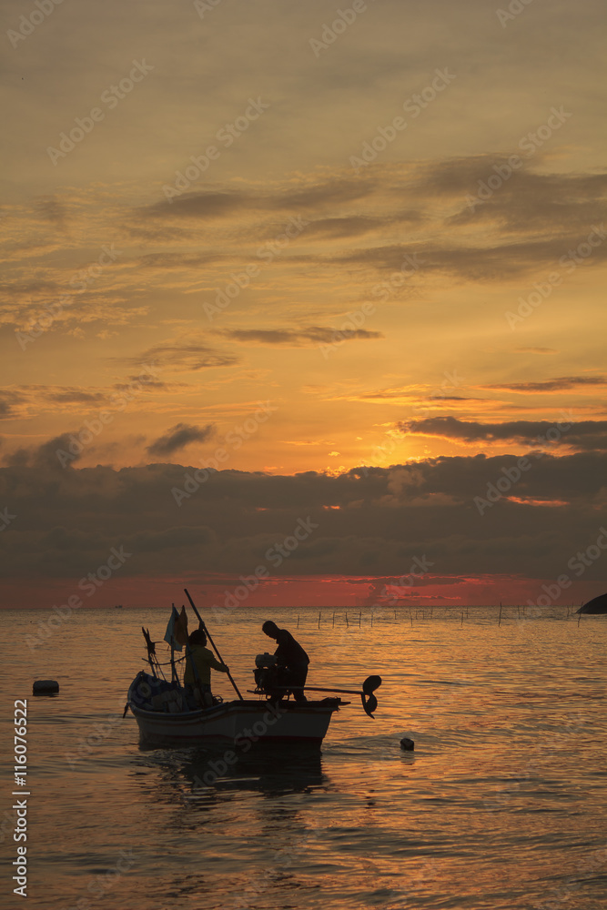 one couple will sail for fishing at dawn ; southern of Thailand

