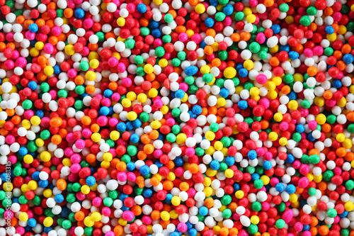 colorful sugar sprinkles background.