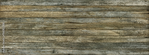 panoramic grunge background of old wood boards toned effect