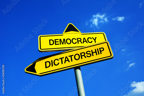 Democracy vs Dictatorship - Traffic sign with two options - democratic election or dictatorship of strong authoritarian ruler with power and dominance. Freedom vs repression and oppression