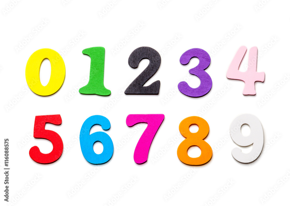 Wooden multicolored numbers close-up, on a white background Wooden multicolored numbers close-up, on a white background