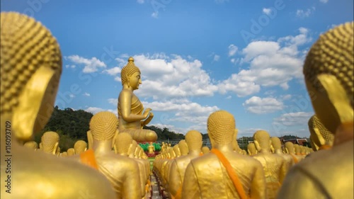 Time lapse Buddha statue with cloud flowing