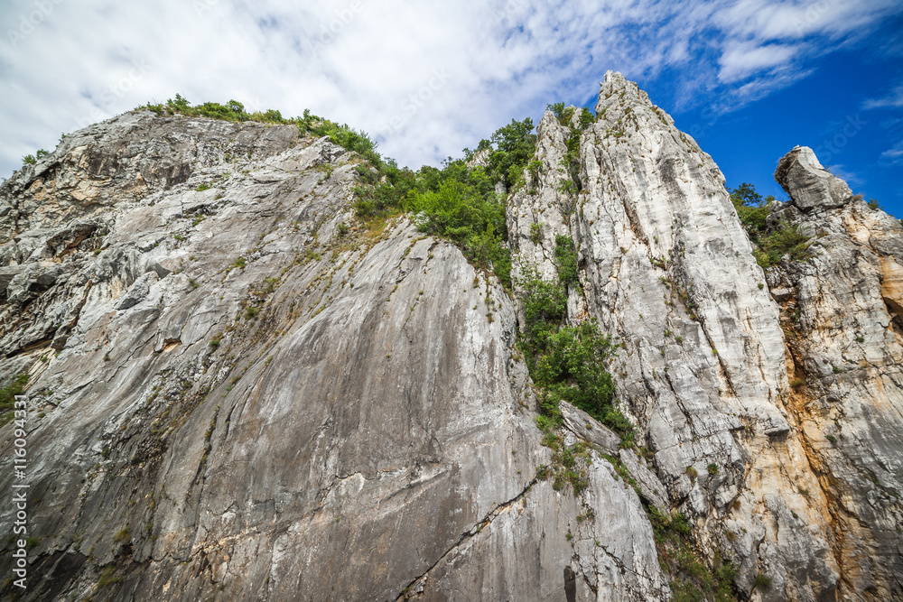 Low angle view of a cliff face Low angle view of a cliff face