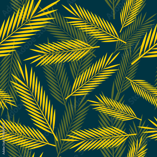 Seamless pattern with yellow palm leaves