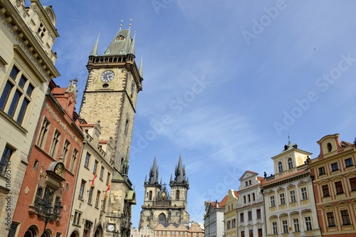 Tyn church and astronomical clock with blue sky © louizaphoto