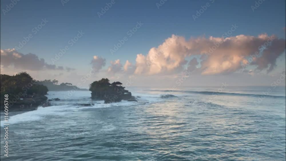 Tourists visiting Pura Tanah Lot temple in Bali Indonesia Tourists visiting Pura Tanah Lot temple in Bali Indonesia