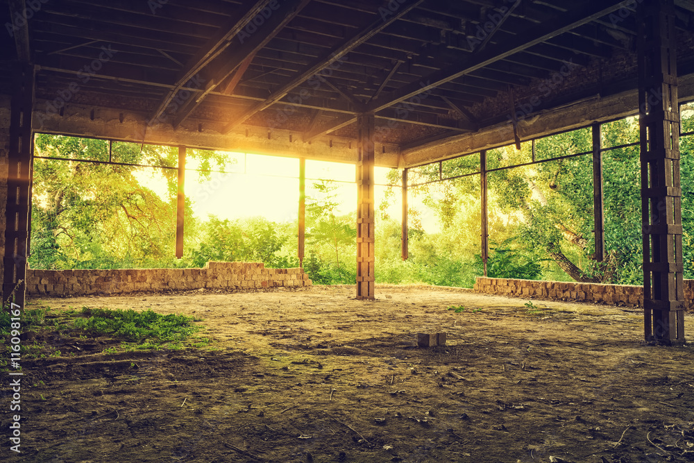 Fototapeta premium Abandoned old industrial building interior