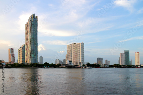 Bangkok pier riverside Thailand, view high building tower, condominium and hotel.