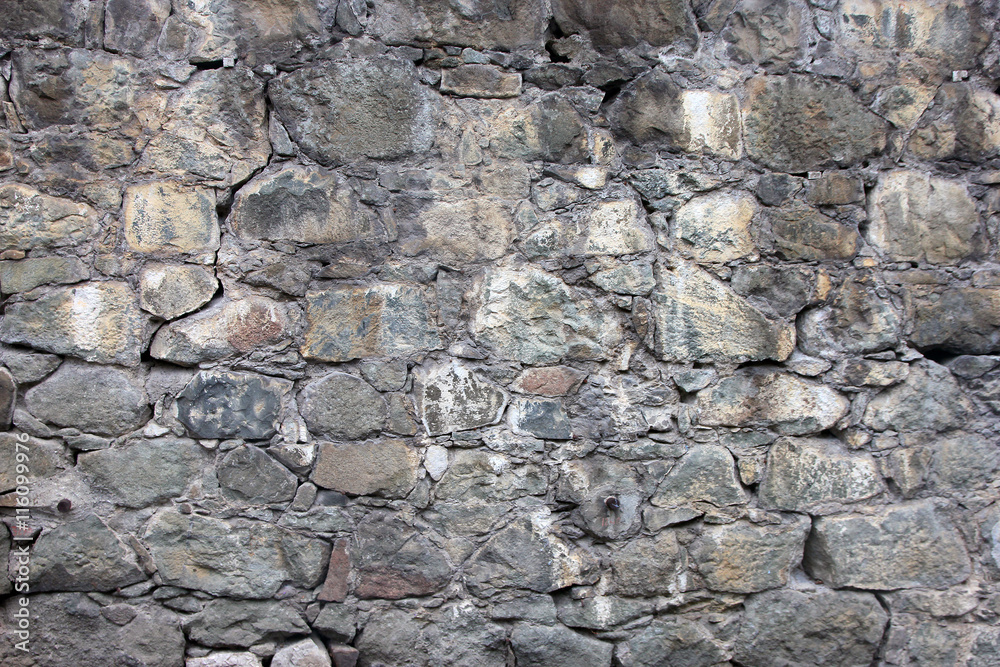 Obraz premium stone masonry wall from old dilapidated shabby rubble from big l