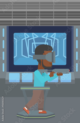 Man in virtual reality headset playing video game.