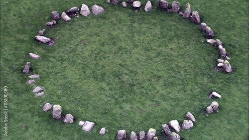 Pull Out From Grass To Reveal Overhead Shot Of Swinside Stone Circle photo