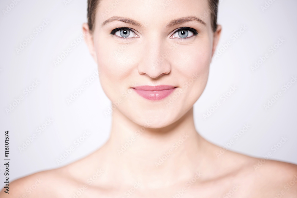 Beautiful woman's face with clean skin Beautiful woman's face with clean skin