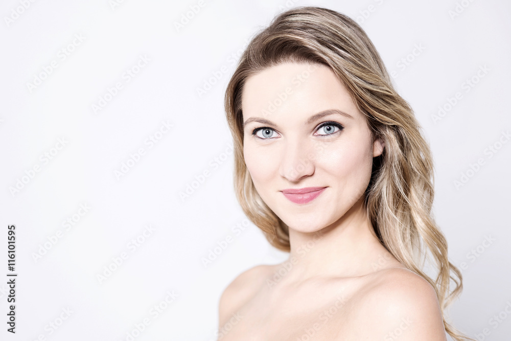 Smiling woman with bare shoulders. Smiling woman with bare shoulders.