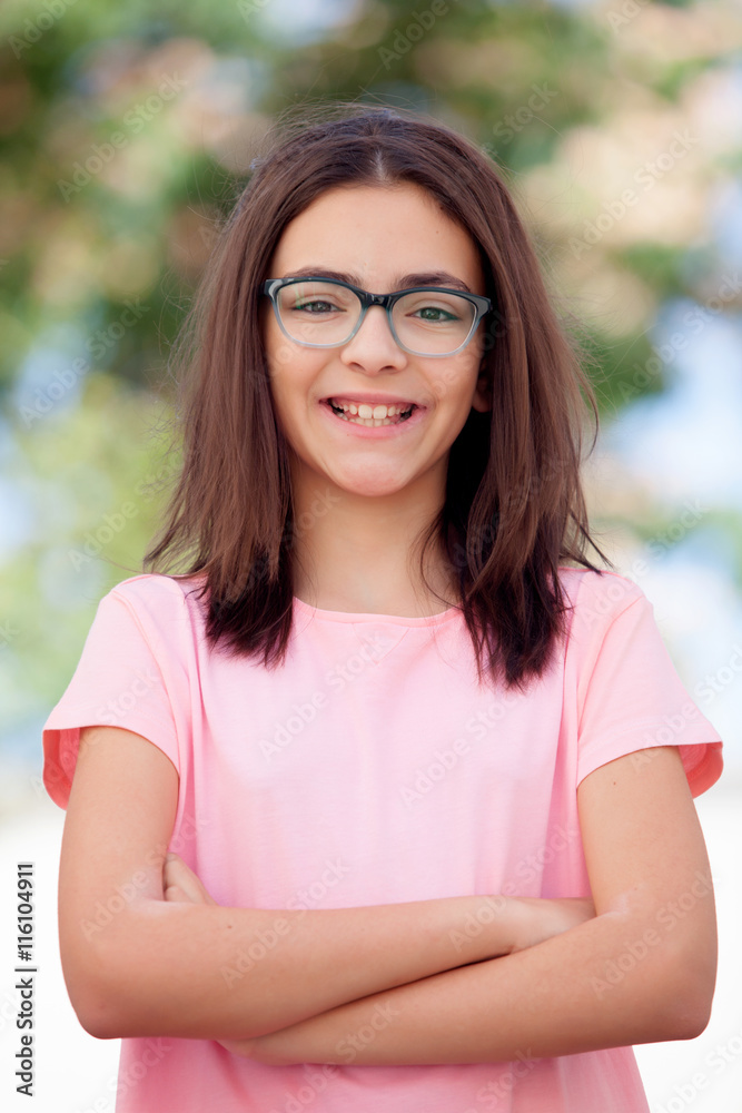 Pretty preteenager girl with glasses outside Pretty preteenager girl with glasses outside