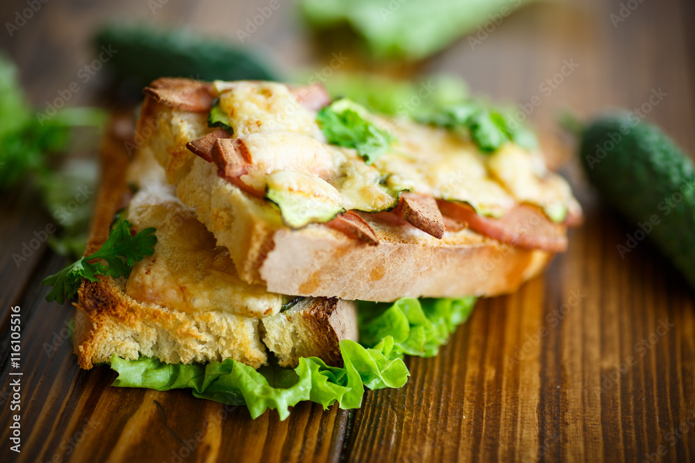 toast baked with sausage, cheese and cucumber toast baked with sausage, cheese and cucumber