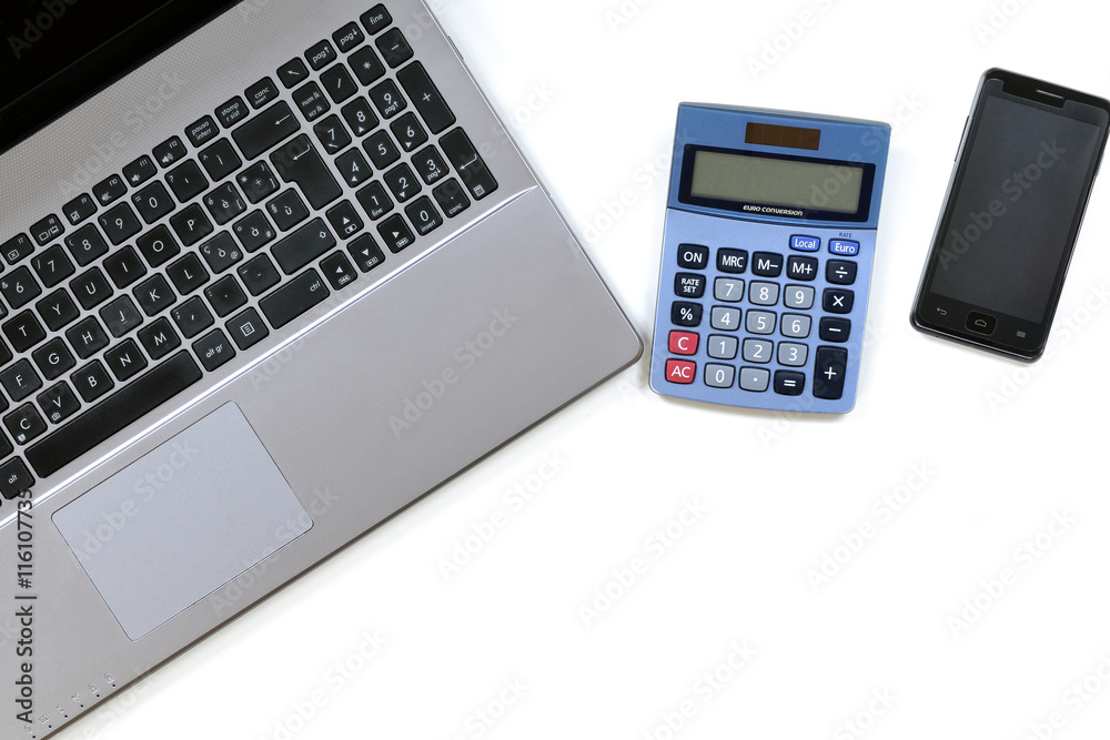 Top view of work items placed on the desk in a modern office