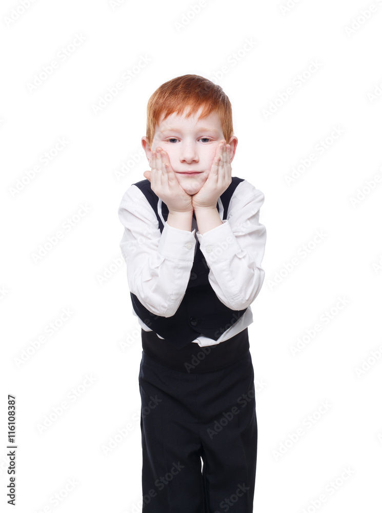 Little redhead boy in vest, propping face isolated on white Little redhead boy in vest, propping face isolated on white