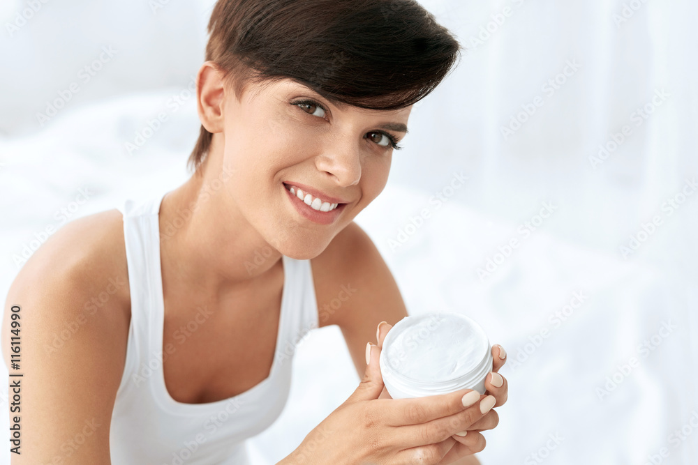 Skin Care. Beautiful Happy Woman Holding Face Cream, Lotion Skin Care. Beautiful Happy Woman Holding Face Cream, Lotion
