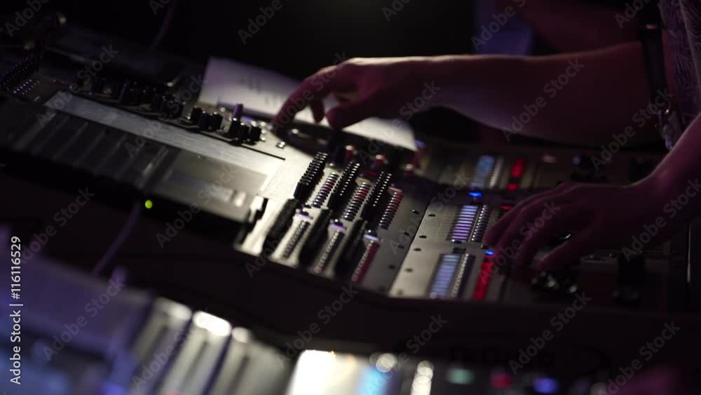 Hands of the Sound Producer Press the Buttons and Move Parts of a Sound Mixer Hands of the Sound Producer Press the Buttons and Move Parts of a Sound Mixer