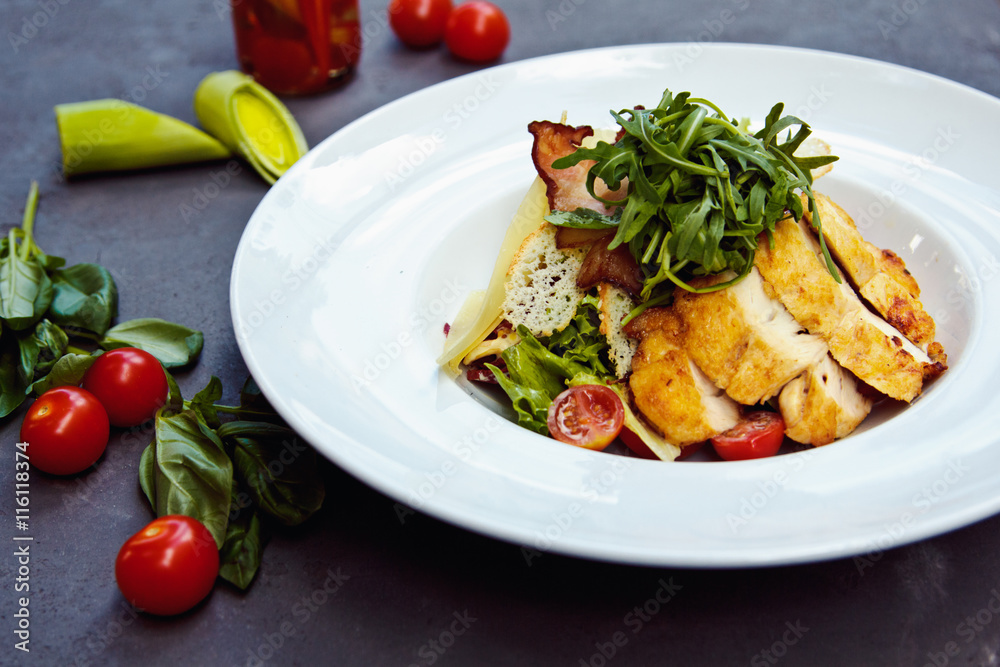 Delicious salad with chicken, nuts, egg and vegetables. Delicious salad with chicken, nuts, egg and vegetables.