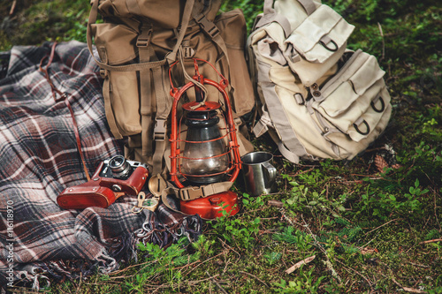 Travel set, blanket are vintage compass, camera, canteen and a flashlight