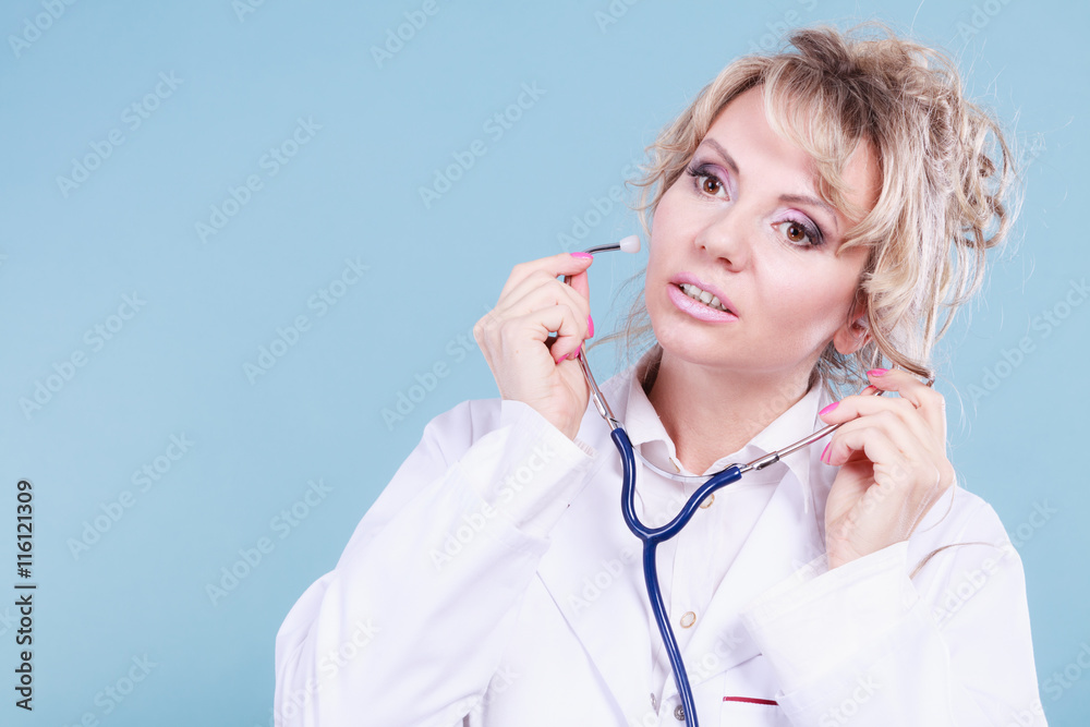 Woman doctor with stethoscope. Woman doctor with stethoscope.