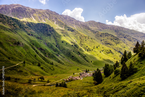 Clouds cover village on a mountaing view (Ponte di legno, Case d