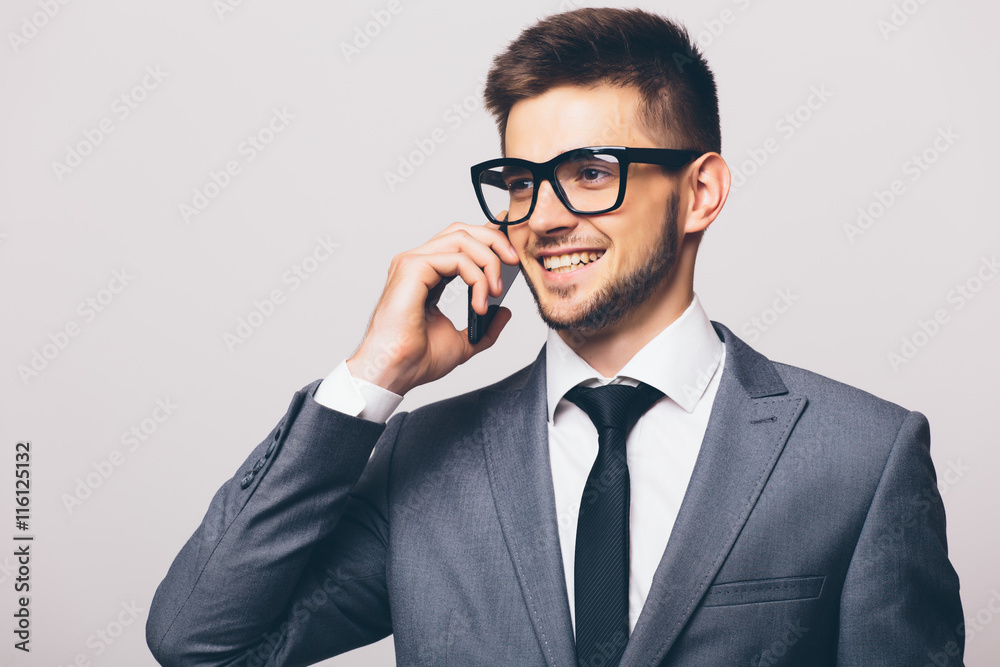 young successful business man having cell telephone conversation young successful business man having cell telephone conversation