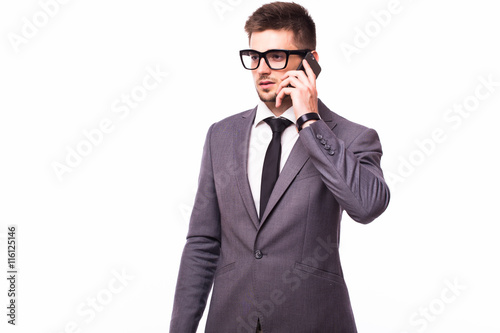 young successful business man having cell telephone conversation