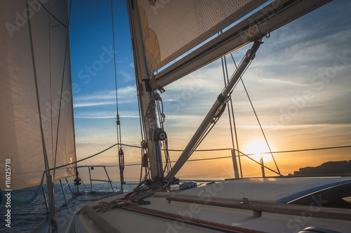 Fototapeta Naklejka Na Ścianę i Meble -  Sailing on the Sea, Sunrise
