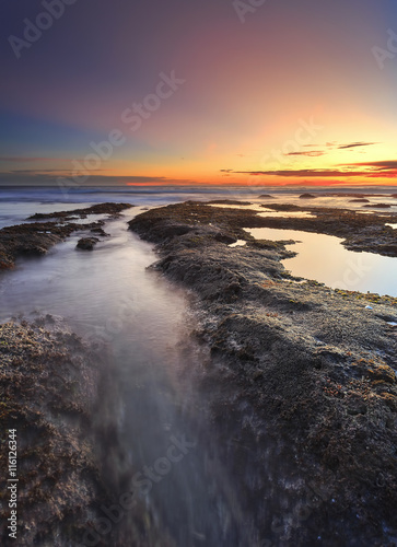 Beautiful seascape of Tanah Lot beach at sunset in bali indonesia