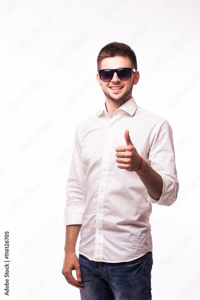 Handsome businessman in sunglasses pointing at camera over white background Handsome businessman in sunglasses pointing at camera over white background