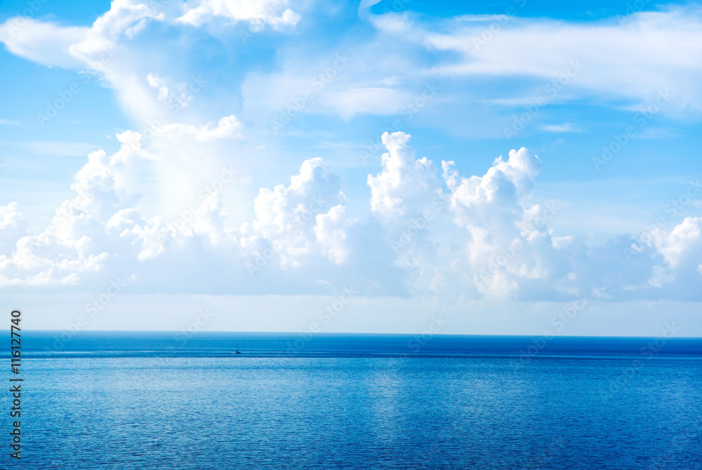 Sunny sky with fantastic white clouds and blue sea. Sunny sky with fantastic white clouds and blue sea.