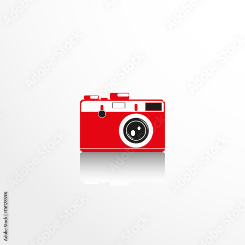 Old camera. Vector icon.