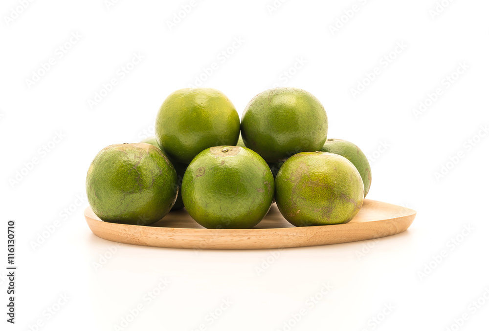 fresh orange on wood plate fresh orange on wood plate