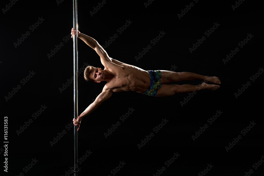 Pole dance. Image of dancer with strained face Pole dance. Image of dancer with strained face