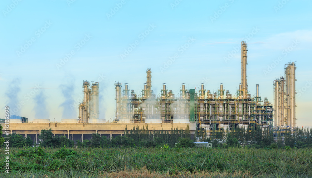 Oil refinery plant with blue sky for energy industry background. Oil refinery plant with blue sky for energy industry background.