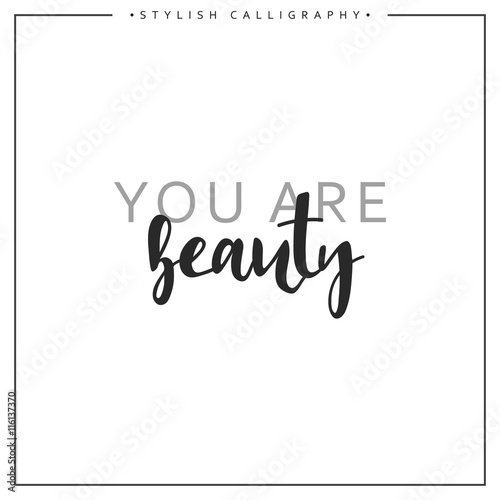 Calligraphy isolated on white background inscription phrase, you are beauty.